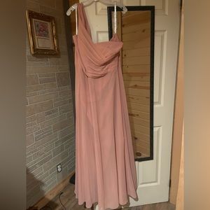 A bridesmaid gown. Worn once bride chose a beautiful dusty rose color.